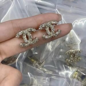 Cc stud earrings